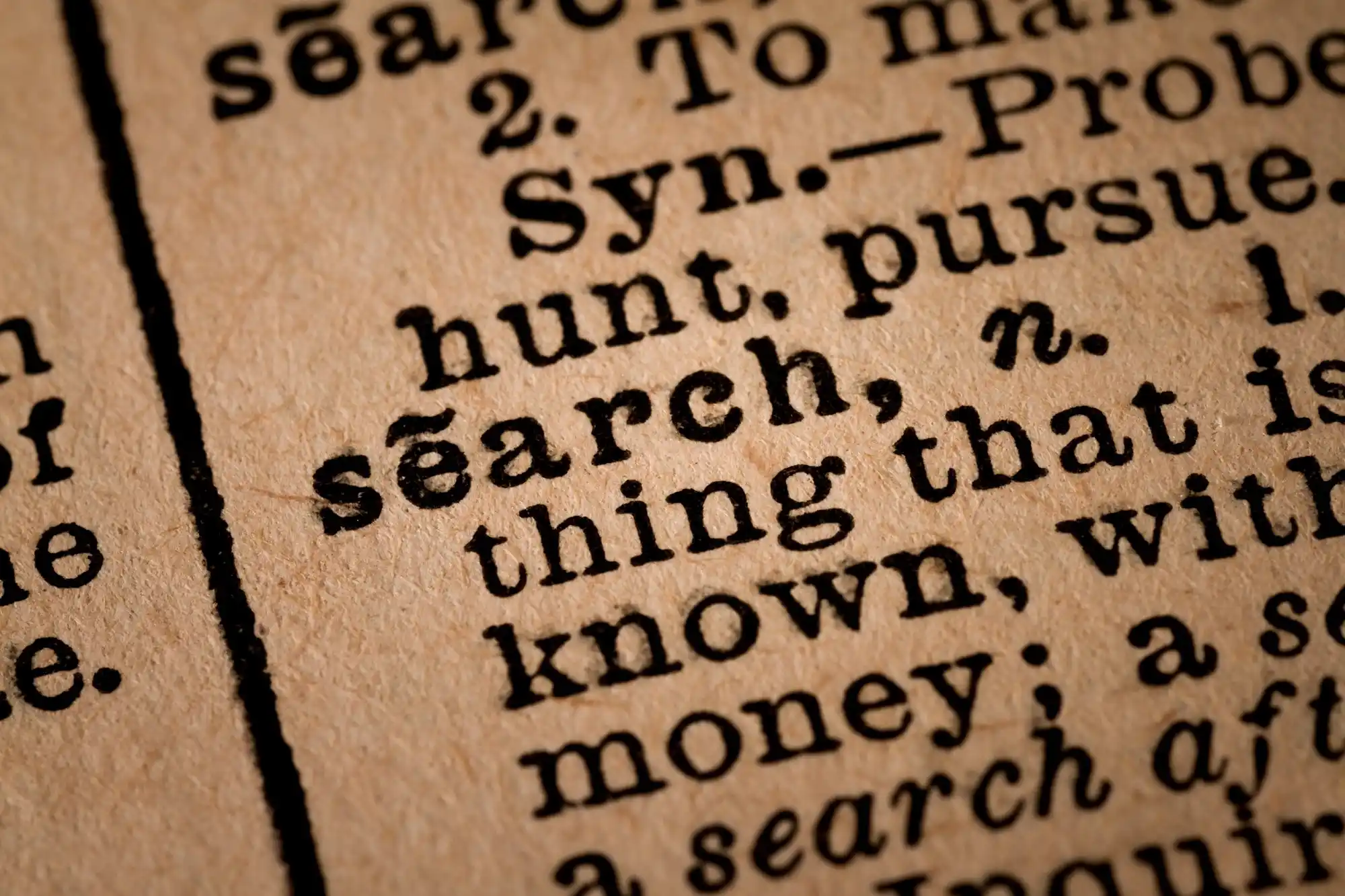 close-up-of-an-opened-dictionary-showing-the-word-search